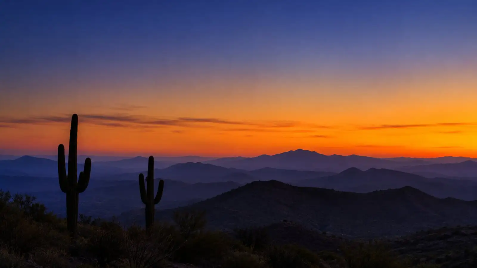 Sonoran Desert ridgeline at dusk, the country Mesa and the East Valley of Arizona sit in